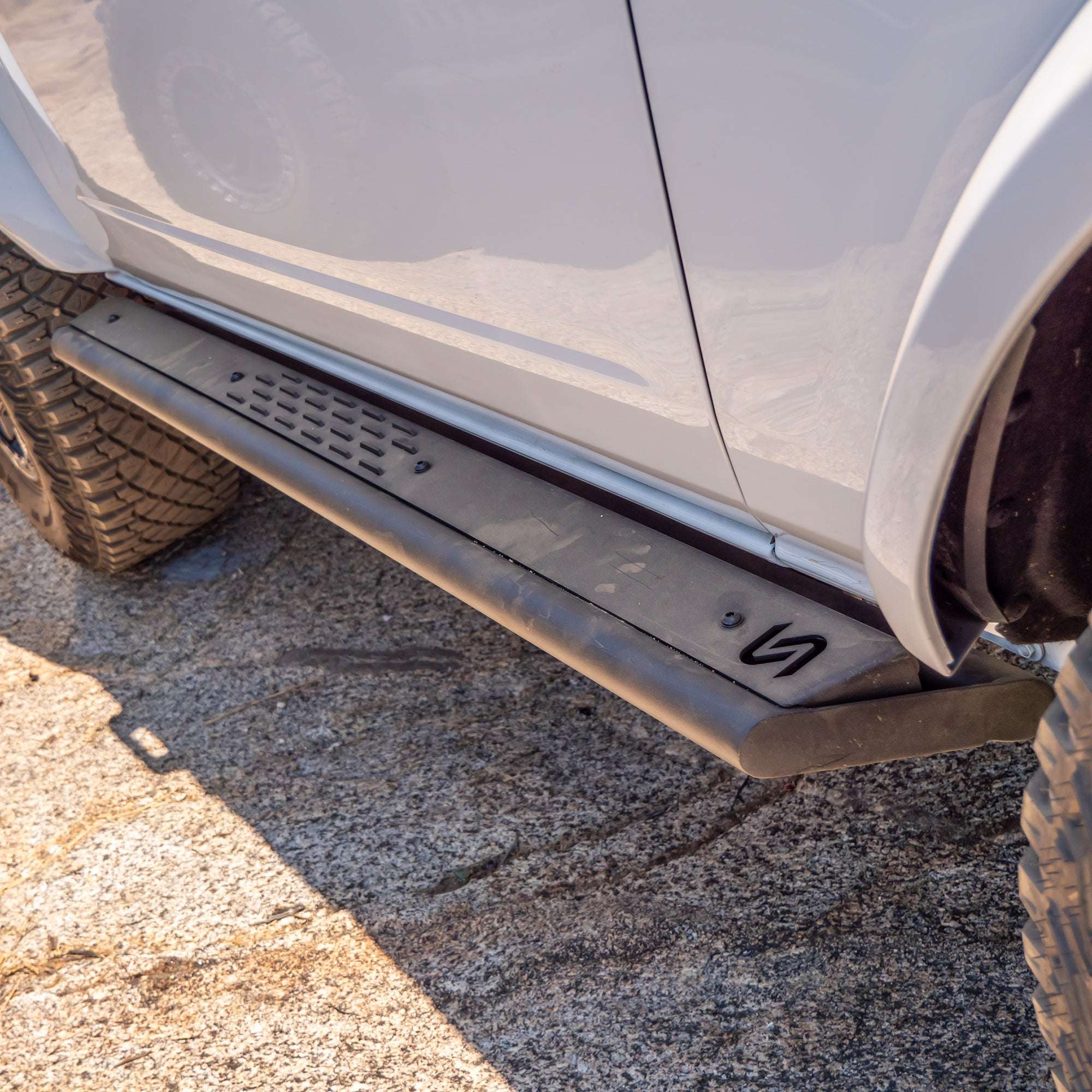 Ford Bronco 2-Door Slider Step with black finish and grip surface