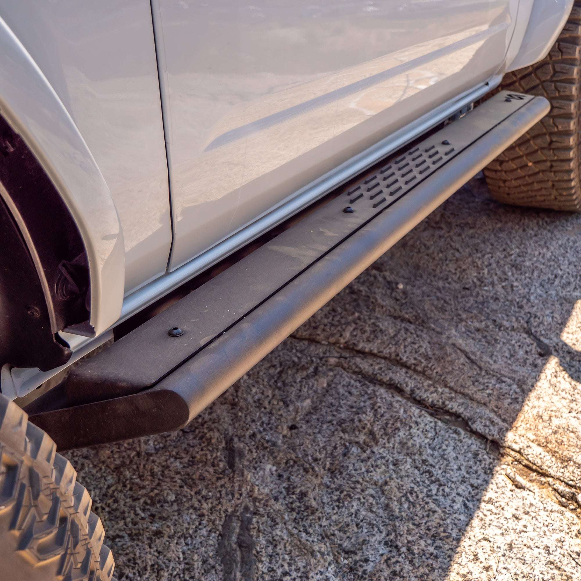 Side view of Ford Bronco 2-Door Slider Step installed on vehicle