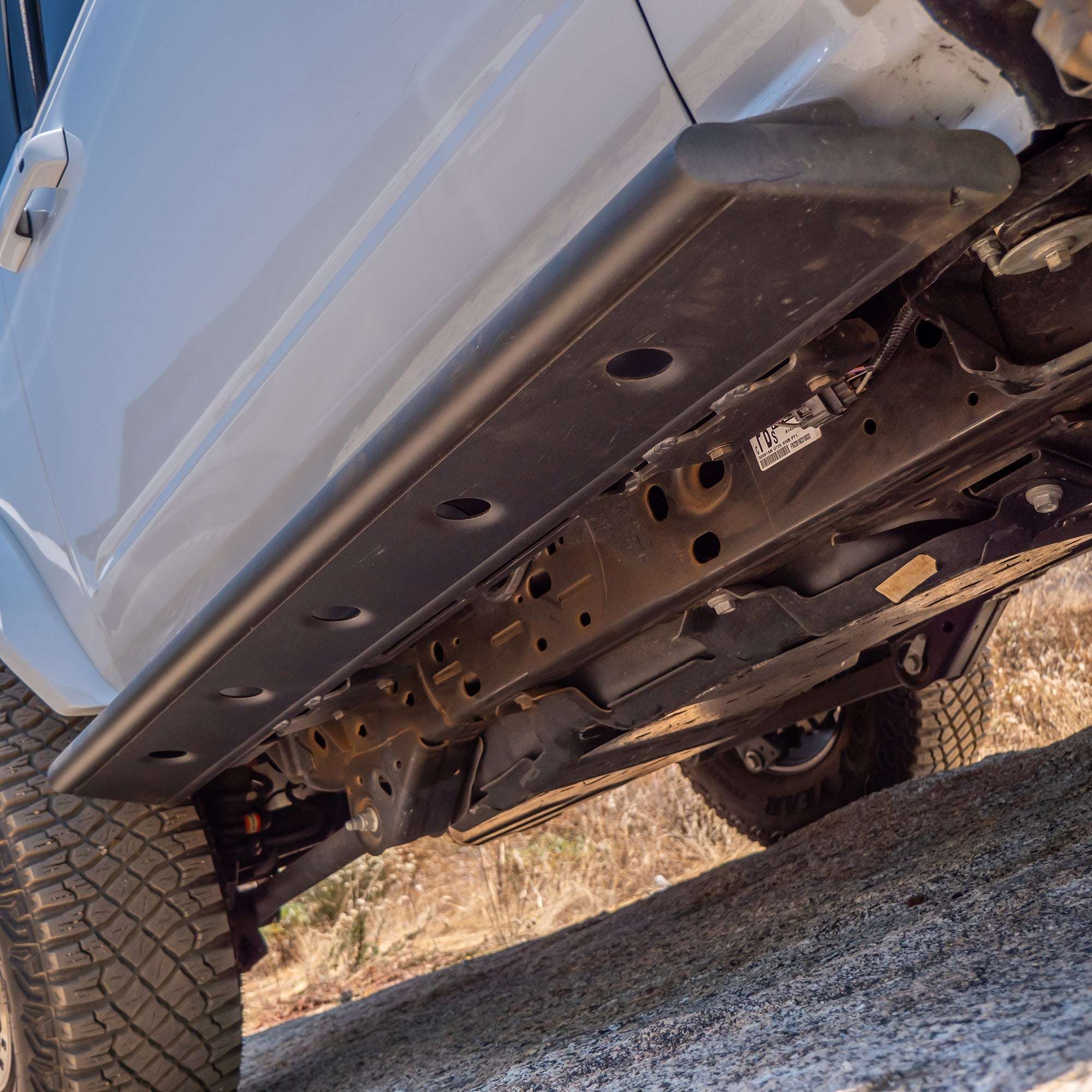 Close-up of vehicle side with step-slider installed on Ford Bronco