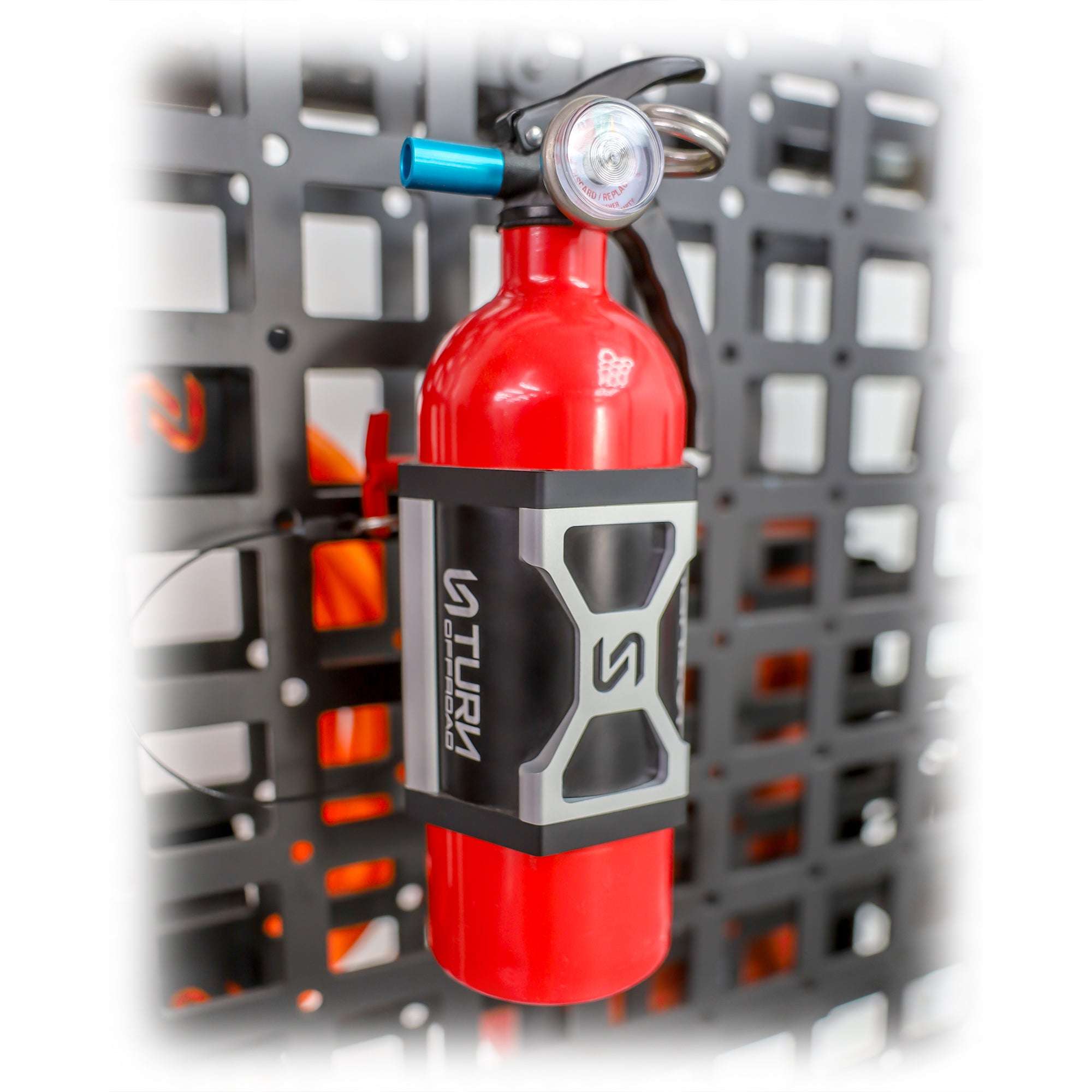 Fire extinguisher mounted with secure bracket and L-track system