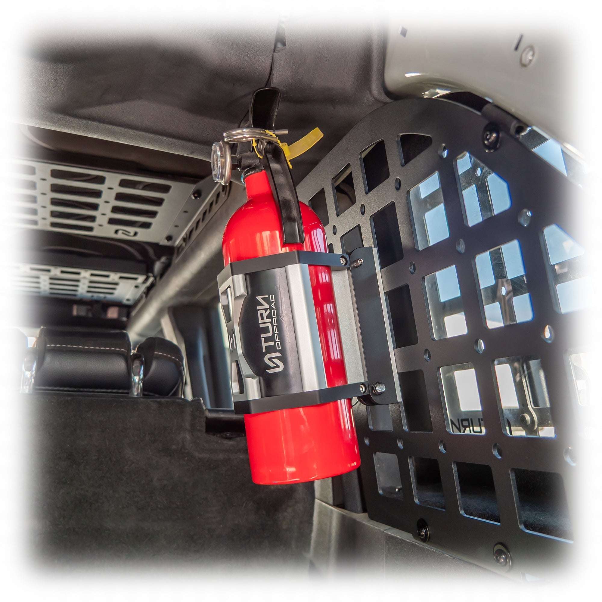 fire extinguisher mount with quick release system in vehicle
