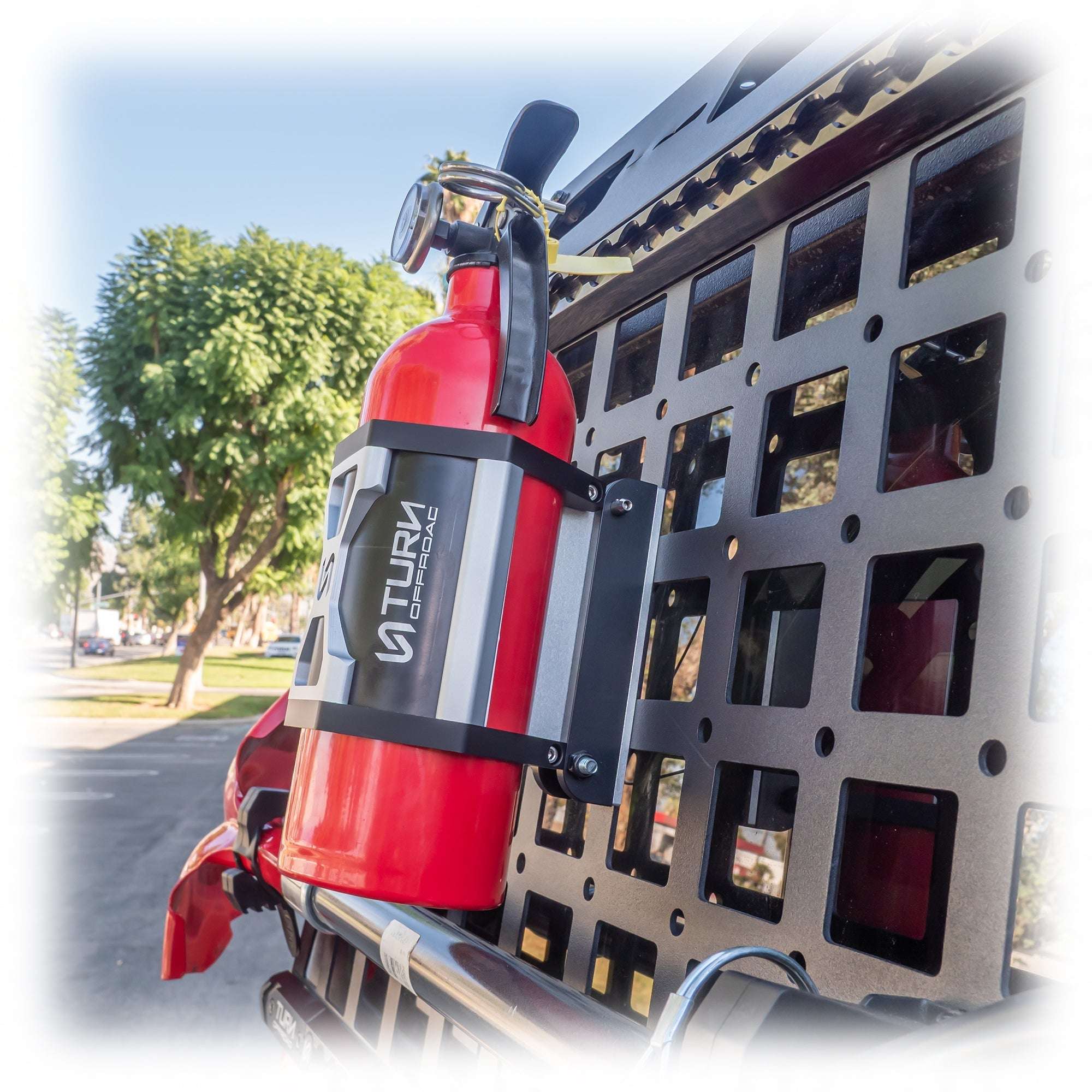 fire extinguisher mounted on vehicle with secure bracket
